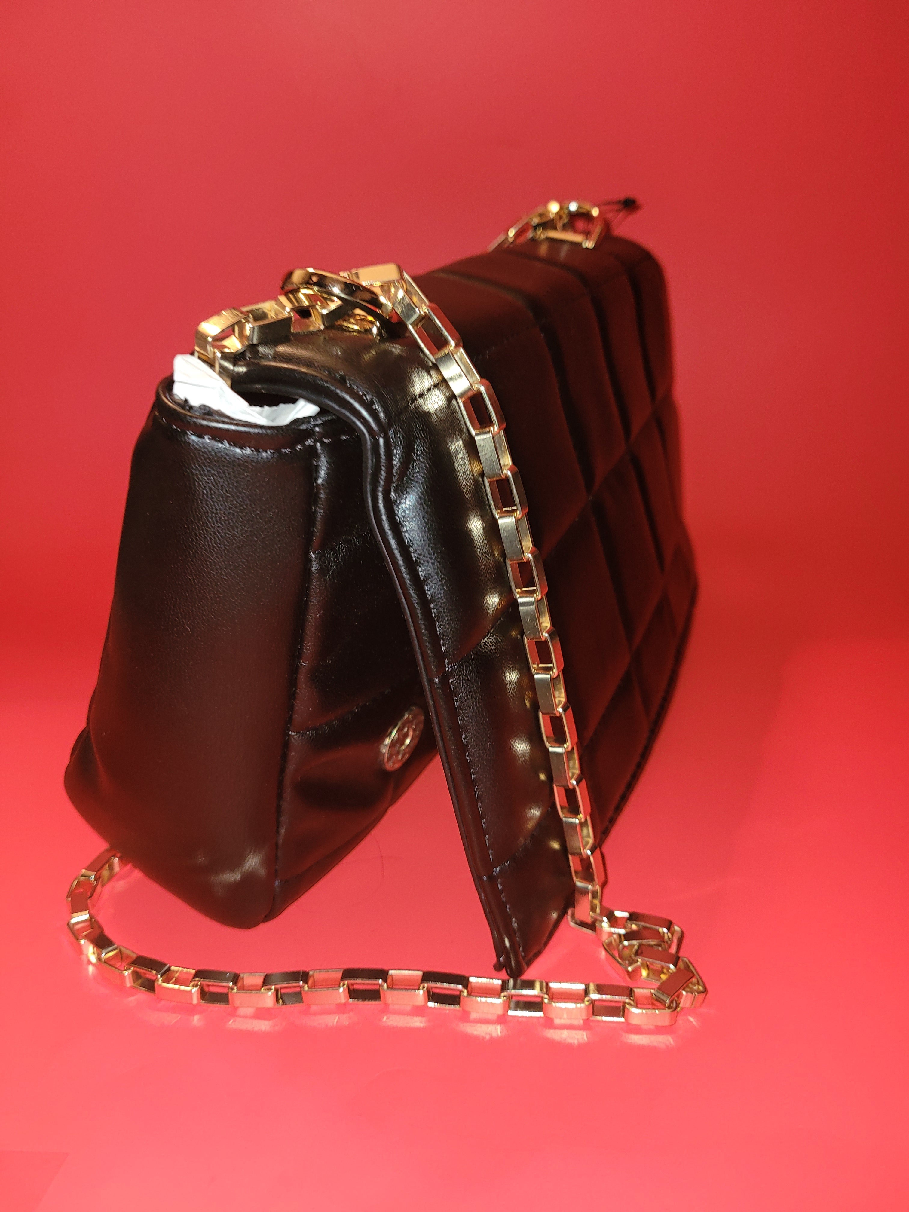 Black padded handbag